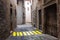concept of contextualization, zebra crossing in a small alley