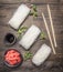 Concept cooking Korean food, glass noodles with herbs wooden rustic background top view