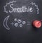 Concept cooking smoothies from fruit and vegetables, on the chalkboard, drawn banana and strawberries top view