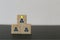 Concept creative idea, leader with idea and innovation. Marble block stacking with human symbol and light bulb icon