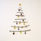 The concept of a decorated Christmas tree on a white background