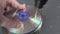 Concept of deleting big data by drilling a hole into the DVD RAM