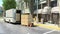 Concept of delivery of goods to a cafe or restaurant boxes are loaded from a truck at the entrance to a cafe 3d render exterior