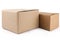 Concept of delivery, package, storage. Two closed cardboard boxes on a white isolated background. Close-up. Mock-up.