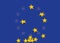 Concept of economic crisis with the flag of Europe symbolically losing its stars.