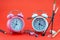 Concept Education or business Alarm clock and teacher glasses Business objects isolated on colorful background Back to school