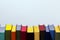 Concept of education and preparation for school. Row of colorful books on the white background.