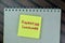 Concept of Figurative Language write on sticky notes isolated on Wooden Table