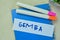 Concept of Gemba write on sticky notes isolated on Wooden Table