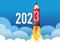 Concept of a greeting card for the year 2023, showing a rocket-shaped pencil.