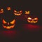 The concept of Halloween. Many glowing fiery light angry scary p