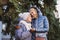 Concept of happy family, old age, emotions, senior care in retirement age. Active senior grandmother and adult daughter hugging