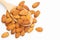 Concept of healthy food, Almond nuts in wooden spoon on pile of almonds over white background