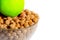 The concept of a healthy lifestyle, treatment of diseases and proper nutrition and dietetics. Green Apple on a bowl of bran in the