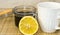 The concept of home treatment of seasonal colds: be healthy. A Cup of hot black tea with lemon and a glass JAR of HONEY