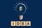 Concept Idea. Light bulb on a blue background. The concept of bright ideas for business, frequently asked questions, creative