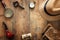 Concept image of investigation or private detective. Fedora hat, magnifying glass and vintage items over wooden table