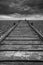 Concept image of path to nowhere in desolate beach black and whi