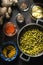 Concept of Indian cuisine with mung dal on the dark background vertical