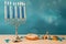 Concept of of jewish religious holiday hanukkah with traditinal chandelier menorah, spinning top toys dreidel, a doughnut and