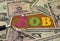 Concept of job search - magnifying glass and money