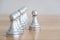 Concept of leadership, think different and recruitment employee. Pawn chess leading others on wooden table. Leadership skills