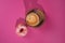 The concept of love for donuts espresso coffee. Creative colorful donuts on pastel pink background. Minimal food concept