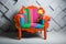 Concept of luxury and success with multi colored velvet armchair, job vacancy