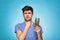 Concept with a man holding a cactus