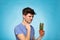 Concept with a man holding a cactus