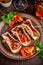 Concept of Mexican cuisine. Mexican appetizer Tacos with vegetables, beans, paprika, chilli peppers on fried unleavened bread