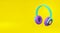 Concept minimalistic metallic purple green headphone cartoon style yellow background. Icon website blog photographer, video,