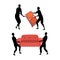 Concept Of Moving. Moving Service Workers Silhouettes In Work Coveralls Unloading Furniture. Moving Process Into a New