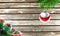 Concept of New Year and Christmas, on a wooden background, Christmas tree branches and a Christmas toy with the flag of Easter