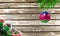 Concept of New Year and Christmas, on a wooden background, Christmas tree branches and a Christmas toy with the flag of Kuban