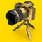 Concept of nonexistent gold DSLR camera with tripod isolated on yellow.