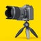 Concept of nonexistent silver DSLR camera with tripod isolated on yellow.