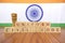 Concept of One law for all called Uniform Civil code or UCC in Indian constitution in wooden block letters and Indian flag as a