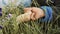 The concept of peace and happiness. Slow motion hand of a man and a woman in medieval costumes lie in the grass