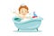 Concept Of Personal Hygiene Procedures. Happy Cheerful Boy Is Taking A Bath. Kid Is Relaxing And Playing With Toy Boat