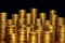 Concept photo.Coins close-up on the table. A lot of coins, selective focus.Front view of stacks of Euro coins.Simple and