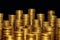 Concept photo.Coins close-up on the table. A lot of coins, selective focus.Front view of stacks of Euro coins.Simple and