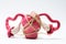 Concept photo of uterus menstrual cramps, pain and painful menstruation dysmenorrhea. Rope tightens around model of uterus with