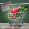 Concept of planning purchases. Shopping cart full of fruits and vegetables