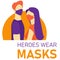 The concept of precautions during a pandemic. Man and woman use medical masks for protection. The inscription heroes