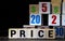 concept of price word on wooden colorful cubes