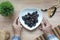 the concept of ramadan, hand holding a bowl of date fruits