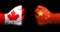 Concept of relations/conflict between Canada and China symbolized by two opposed clenched fists