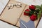 Concept romantic, old notebook, roses and glasses