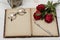 Concept romantic, old notebook, roses and glasses